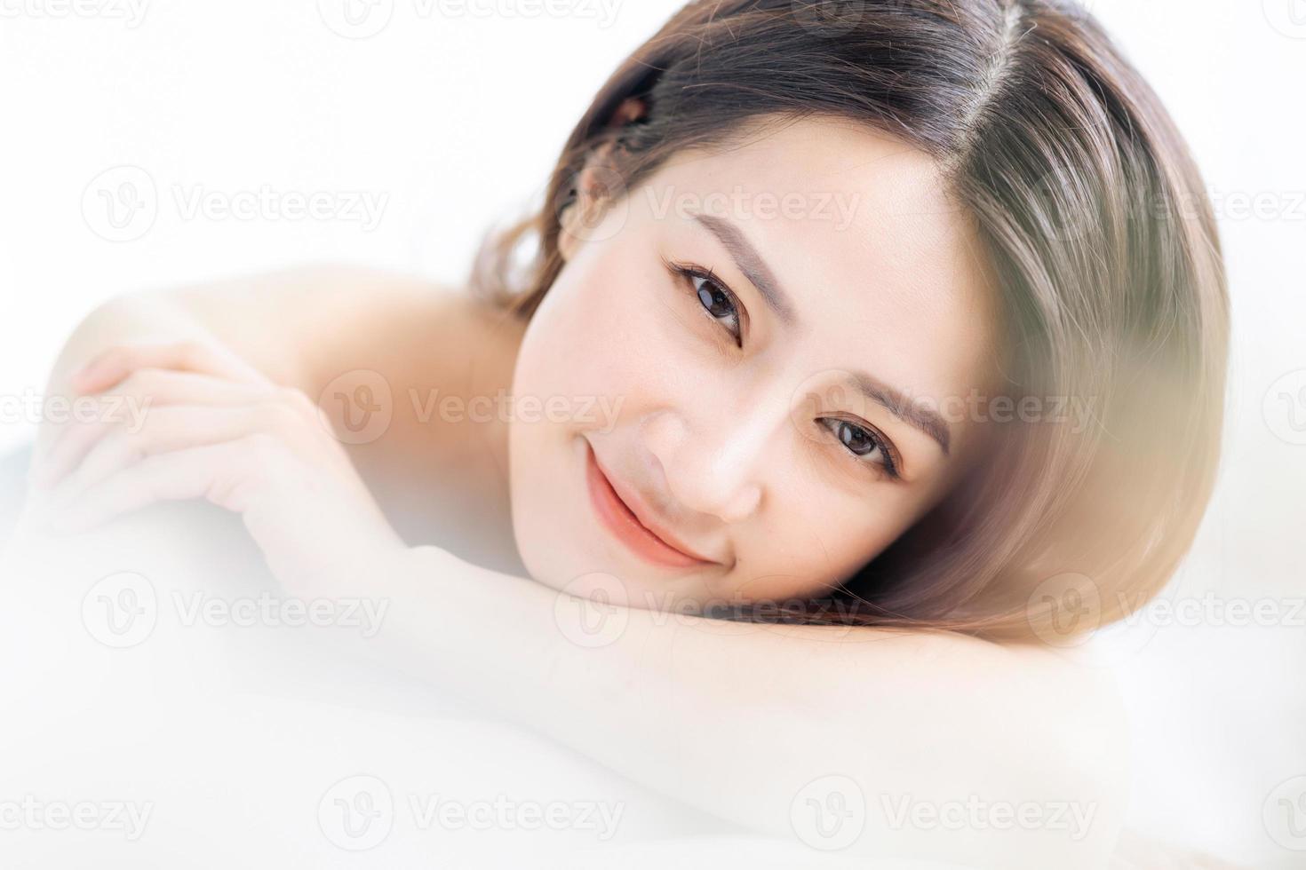 Asian woman going to beauty, skin care in spa photo