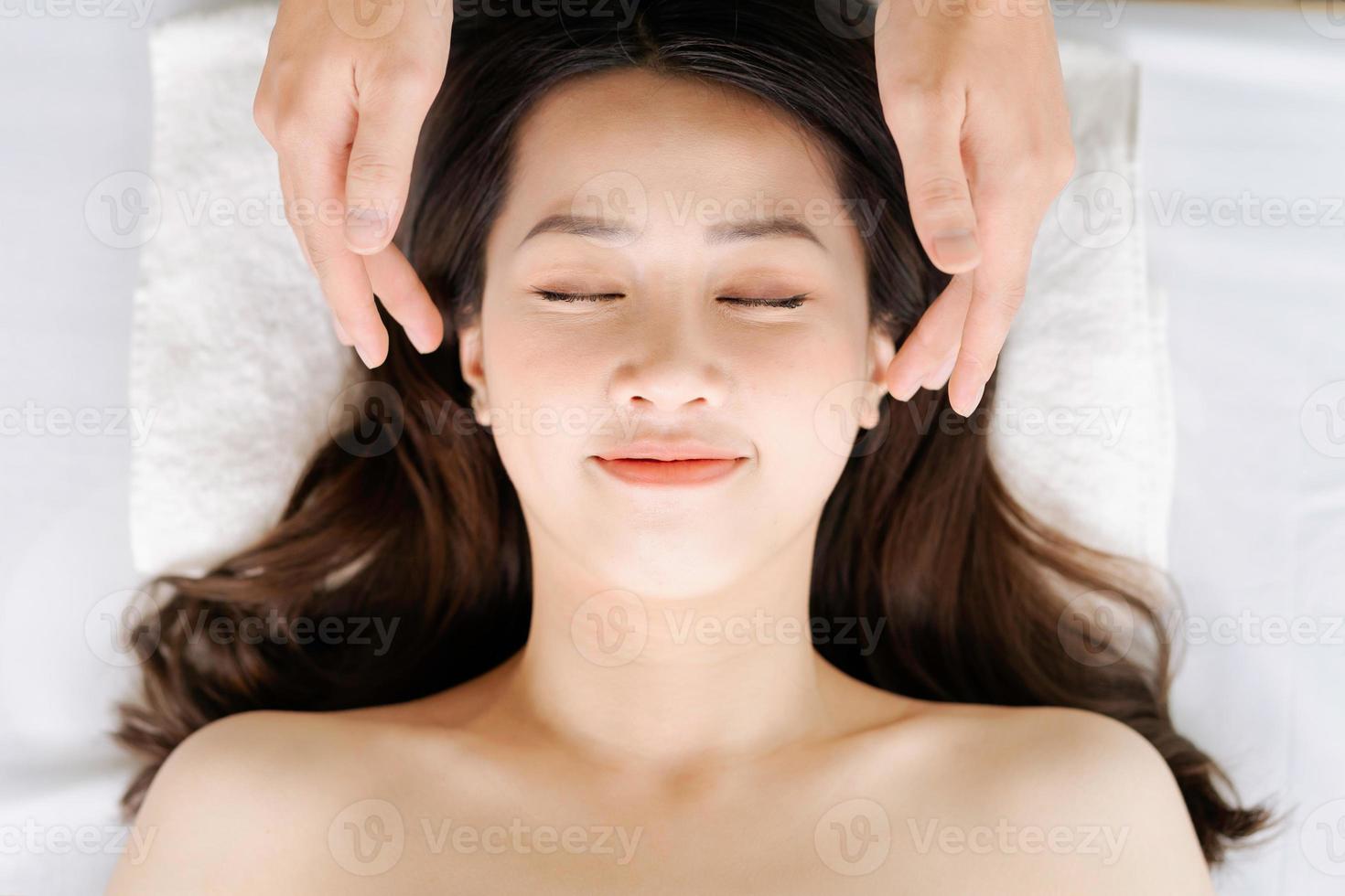 Asian woman going to beauty, skin care in spa photo