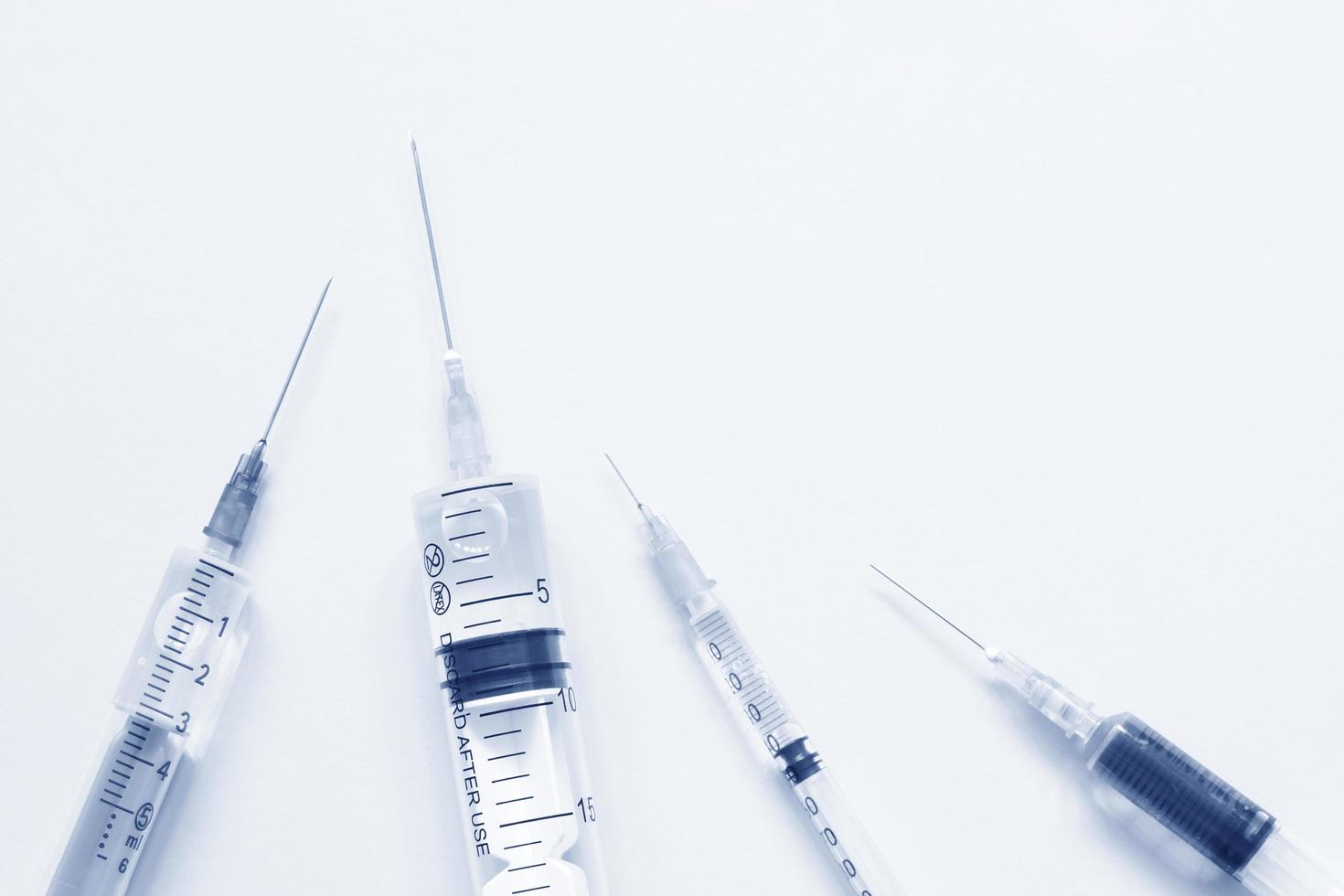 Close up image of a syringe photo