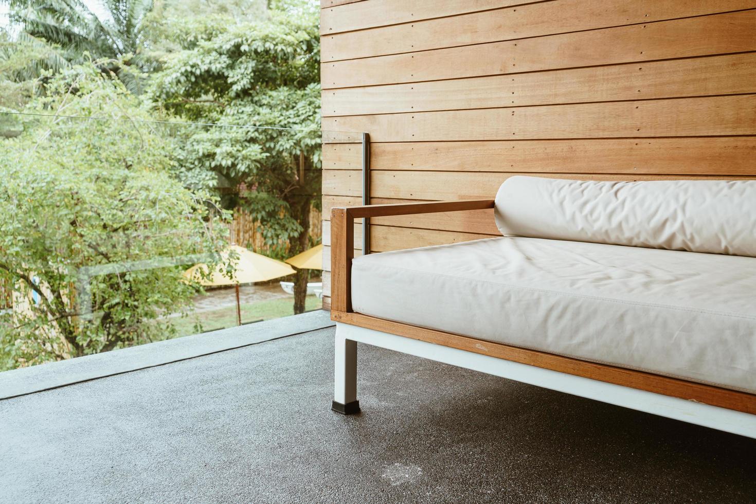 Empty bench sofa or sofa bed on the balcony for relaxing photo