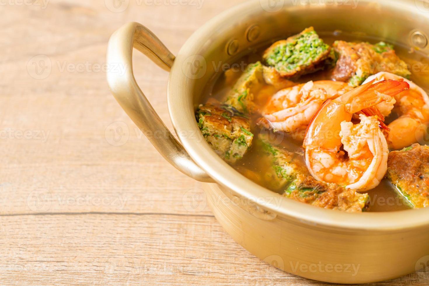 Sour soup made of Tamarind Paste with Shrimps and Vegetable Omelet photo