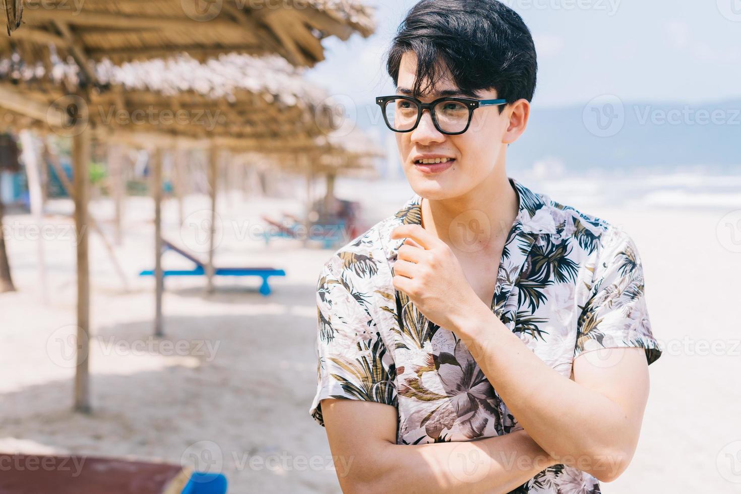 Portrait of Asian man on the beach photo