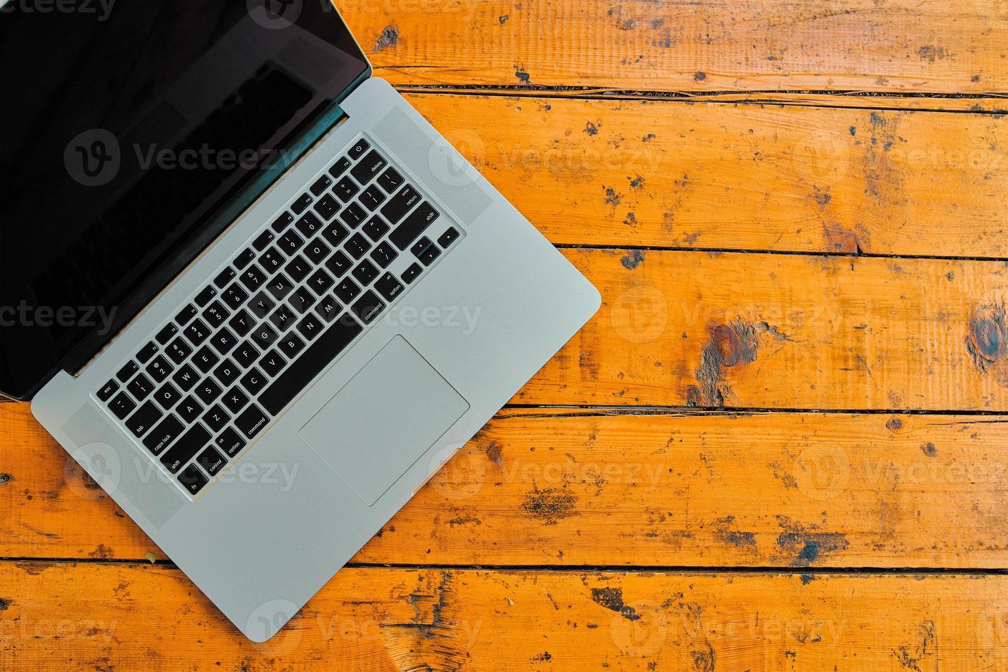 Laptop computer on office table background. photo