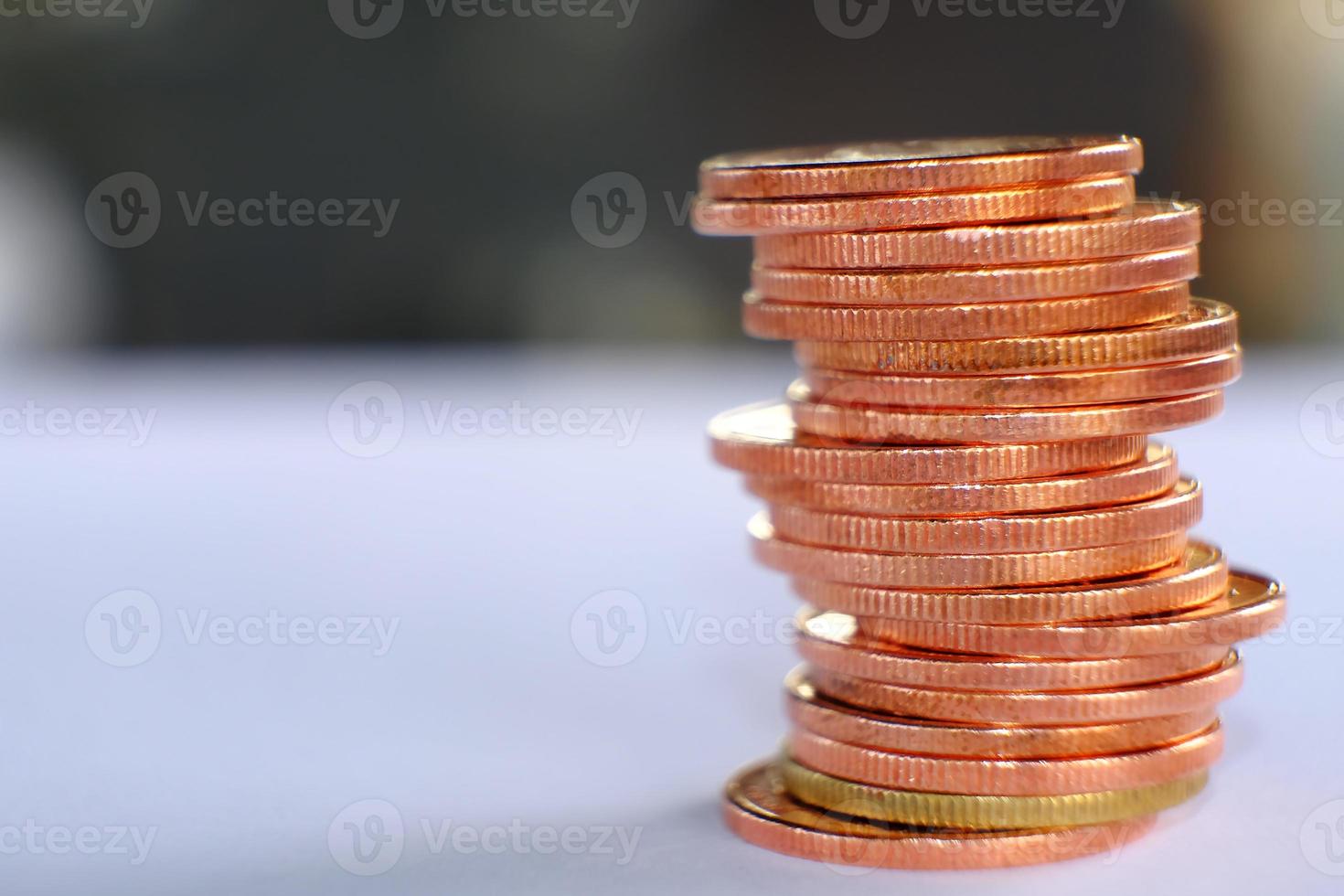 saving money concept, stacking coins background, advertising coins of finance and banking photo