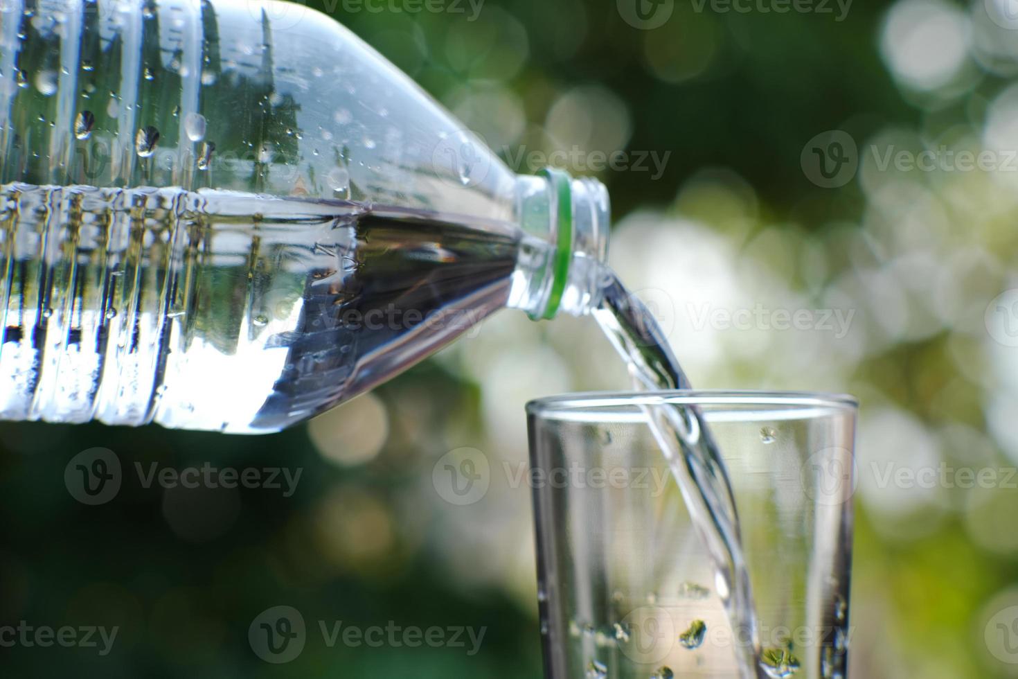 drinking water on wood table and space for text photo