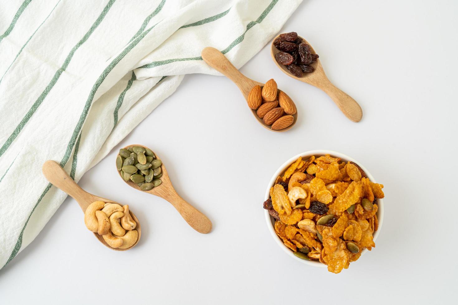Grains cornflakes of cashew nut, almond, pumpkin seeds and sunflower seeds - healthy multigrain food photo