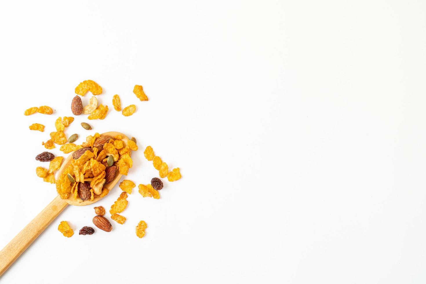 Grains cornflakes of cashew nut, almond, pumpkin seeds and sunflower seeds - healthy multigrain food photo