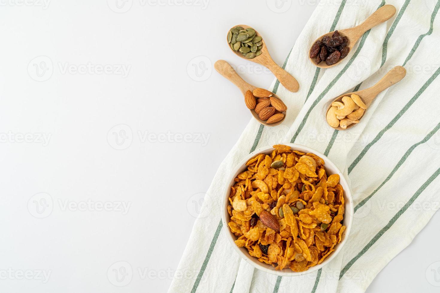 Grains cornflakes of cashew nut, almond, pumpkin seeds and sunflower seeds - healthy multigrain food photo