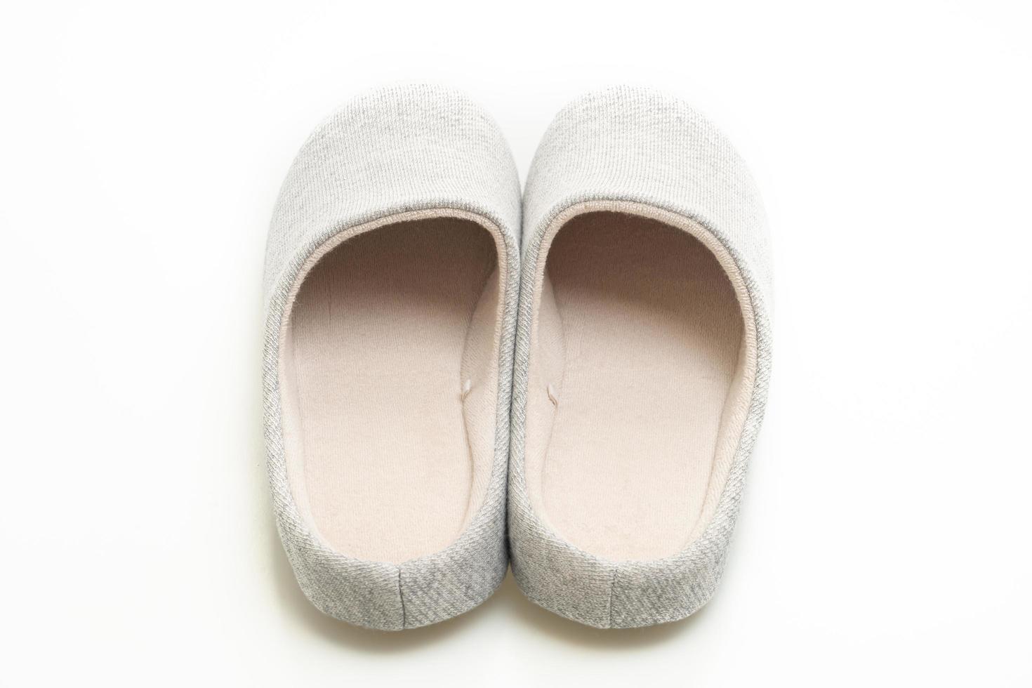 Grey slipper isolated on white background photo