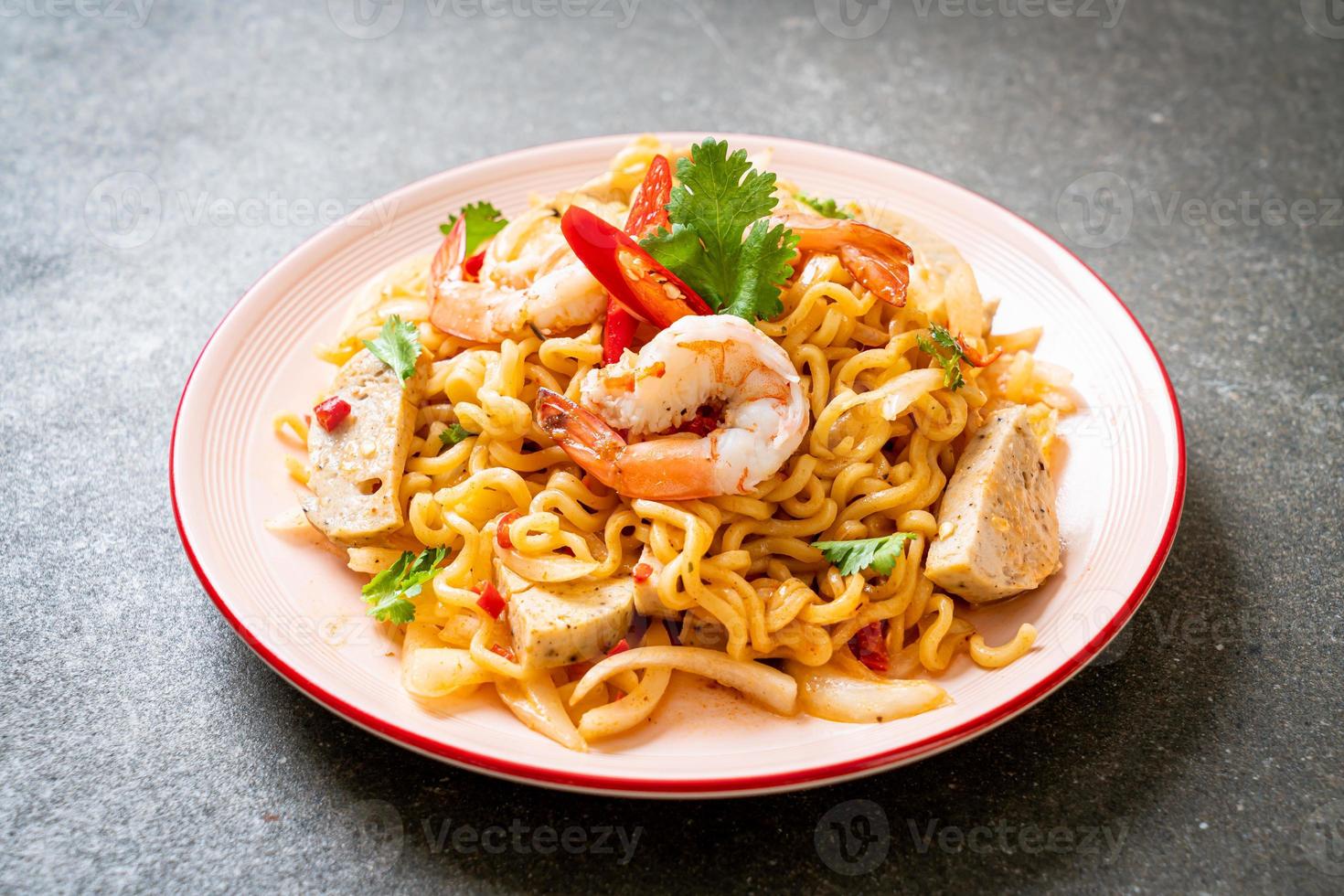 Spicy instant noodles salad with shrimps - Thai food style photo