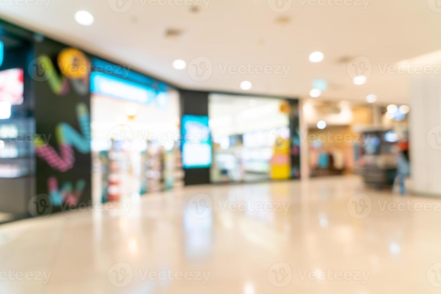 Abstract blur shop and retail store in shopping mall for background photo