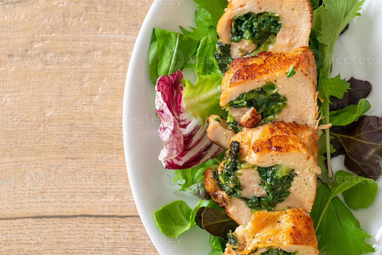 Chicken breast stuffed with cheese and spinach photo