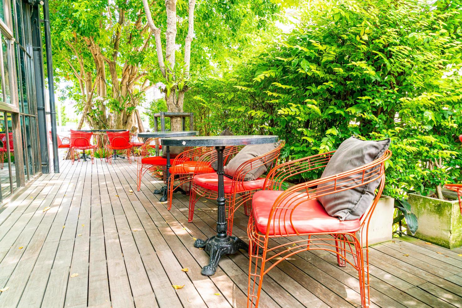 Outdoor patio chair and table in cafe restaurant photo