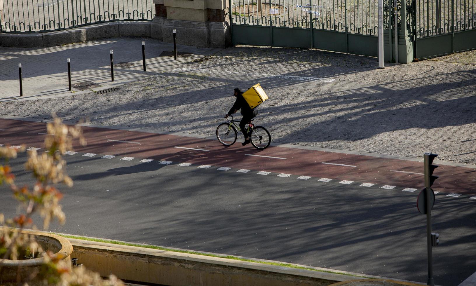 Bicycle messenger on the streets of Madrid, Spain photo