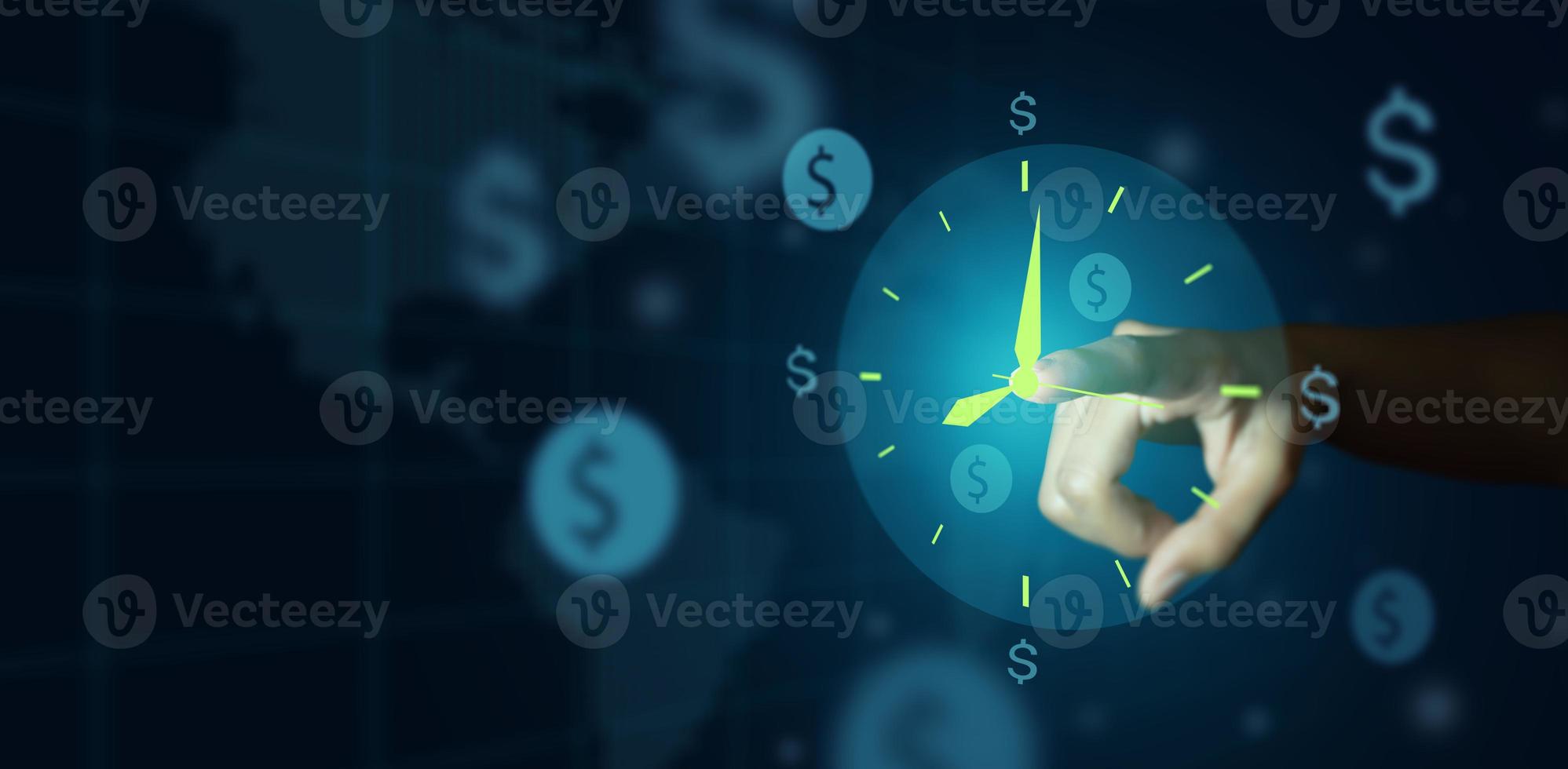 Businessman hand pointing to clock and money sign concept photo