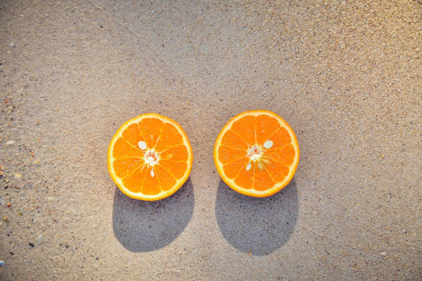 Orange is on beach sea view background,Summer holiday concept photo