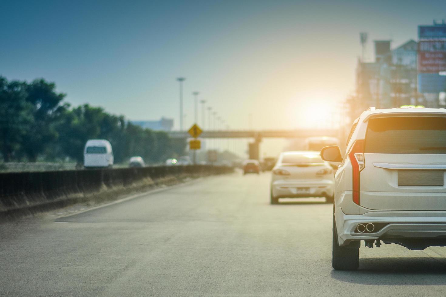 MPV 7 seat Car Automotive Driving on highway road photo