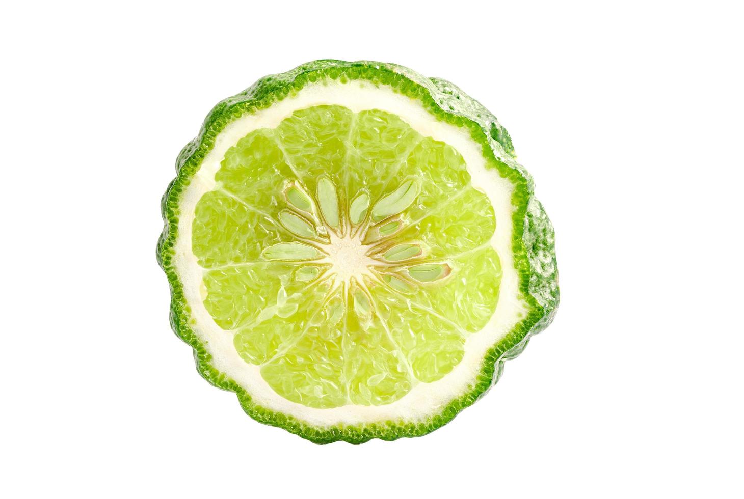Fresh bergamot fruit with cut in half on white background with clipping path. photo