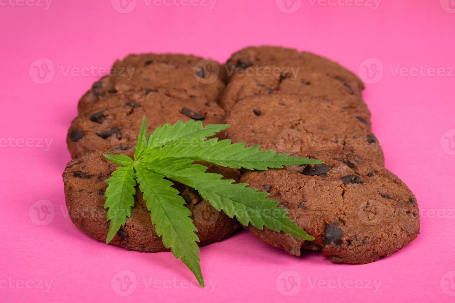 chocolate cookies with THC and CBD effect, sweet food with marijuana photo