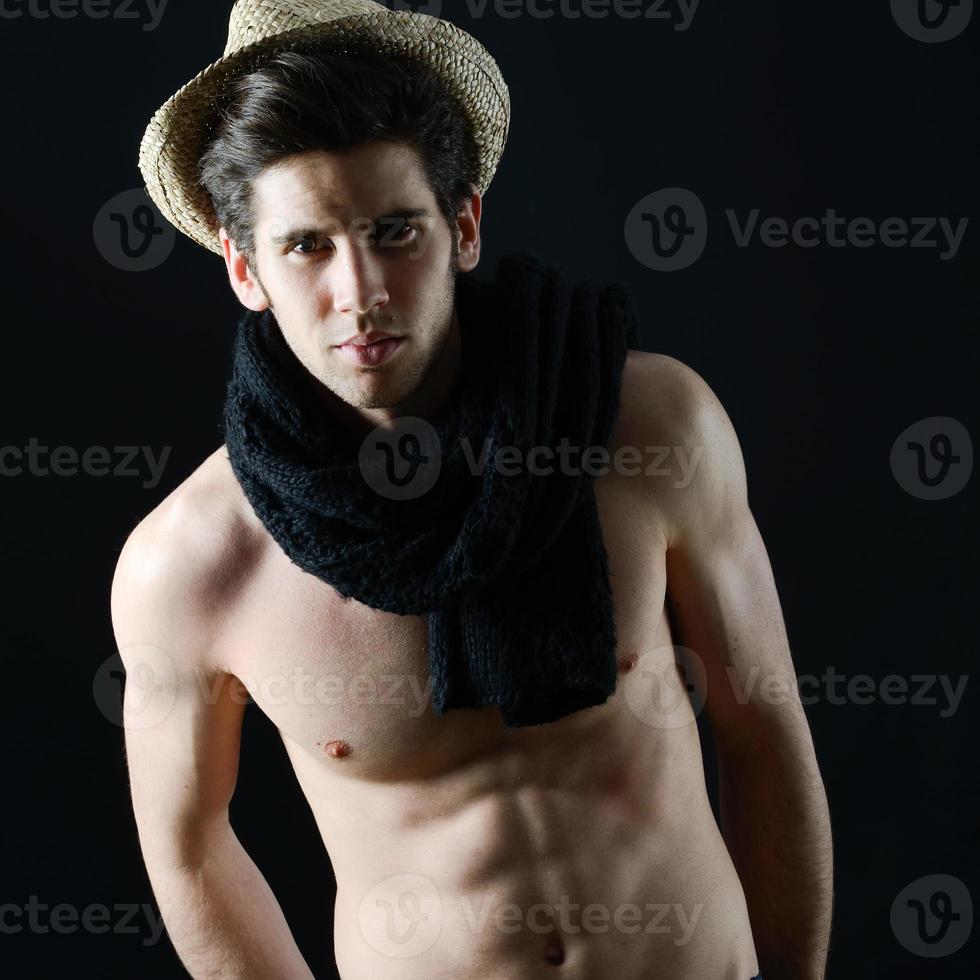 Handsome man wearing hat and scarf photo