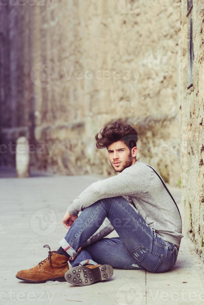 Man wearing suspenders in urban background 2885905 Stock Photo at Vecteezy