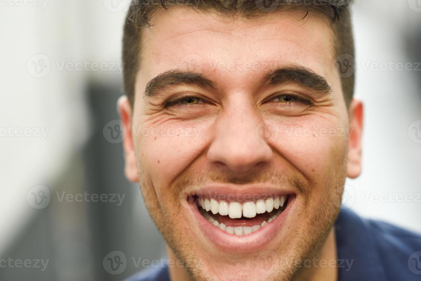 Young handsome man smiling photo