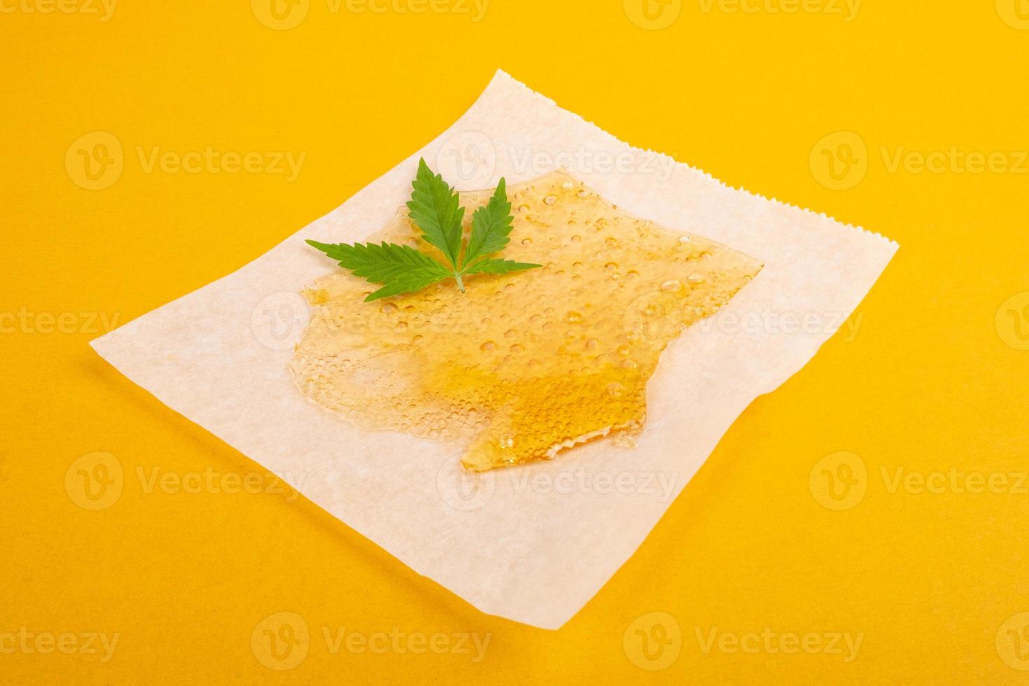 marijuana resin concentrate, yellow amber color cannabis wax photo