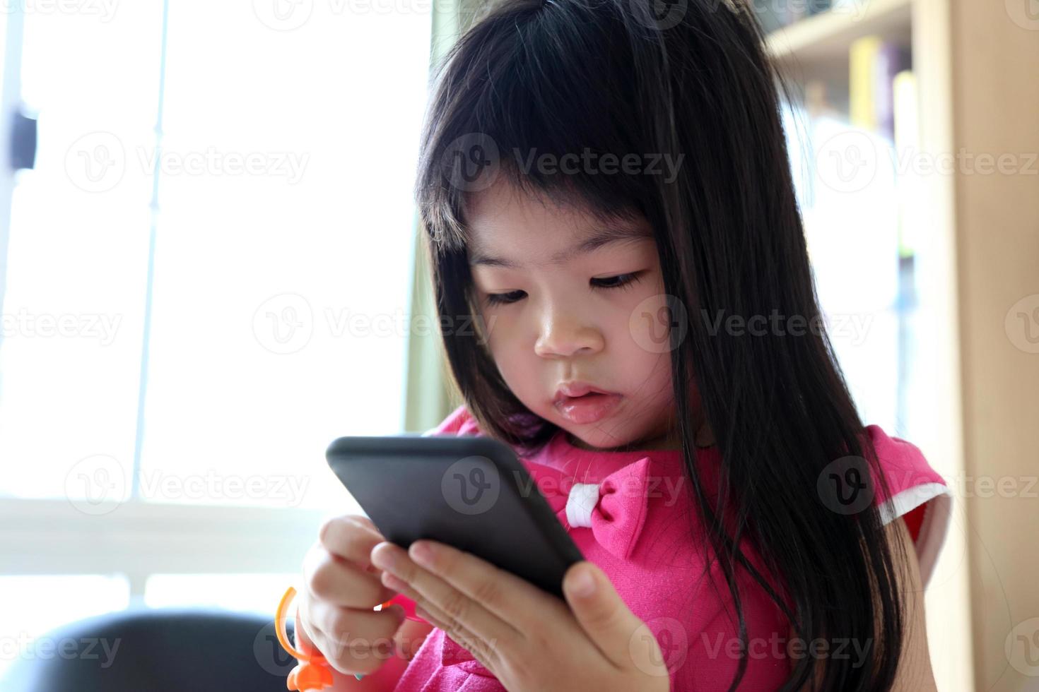 Kid with Technology photo