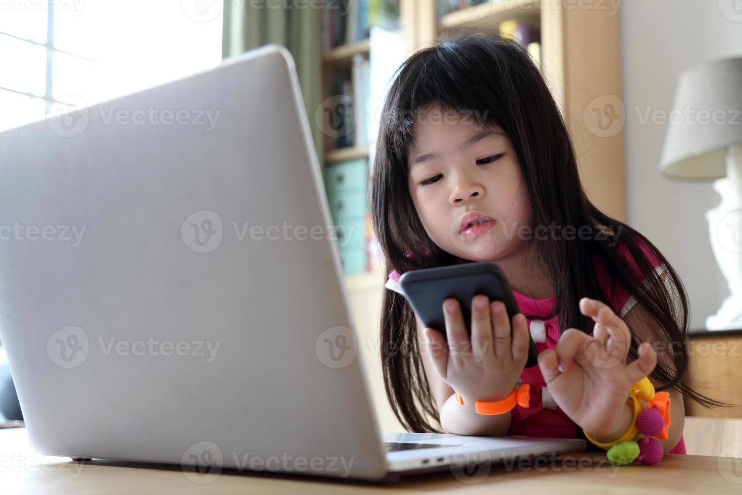 Kid with Technology photo