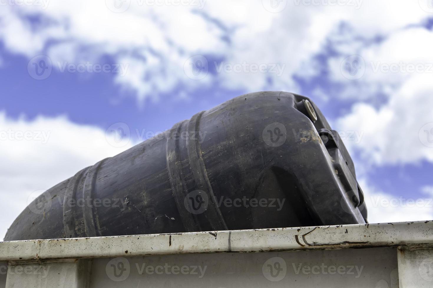 Drum of oil thrown in the trash photo