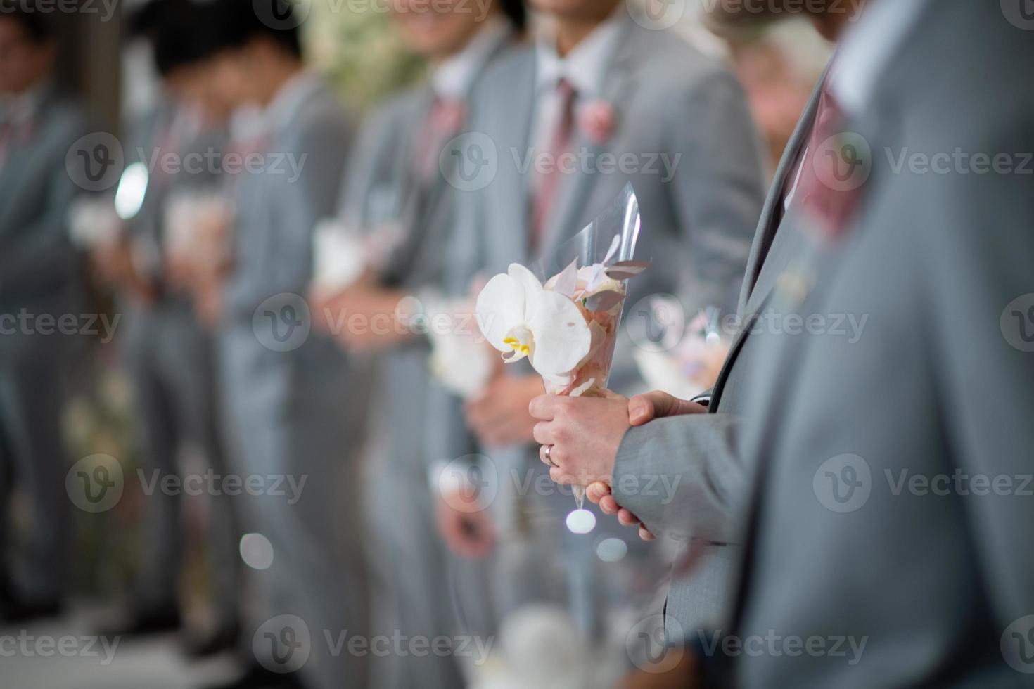 Wedding flower on hand with blur background, bouquet flower photo