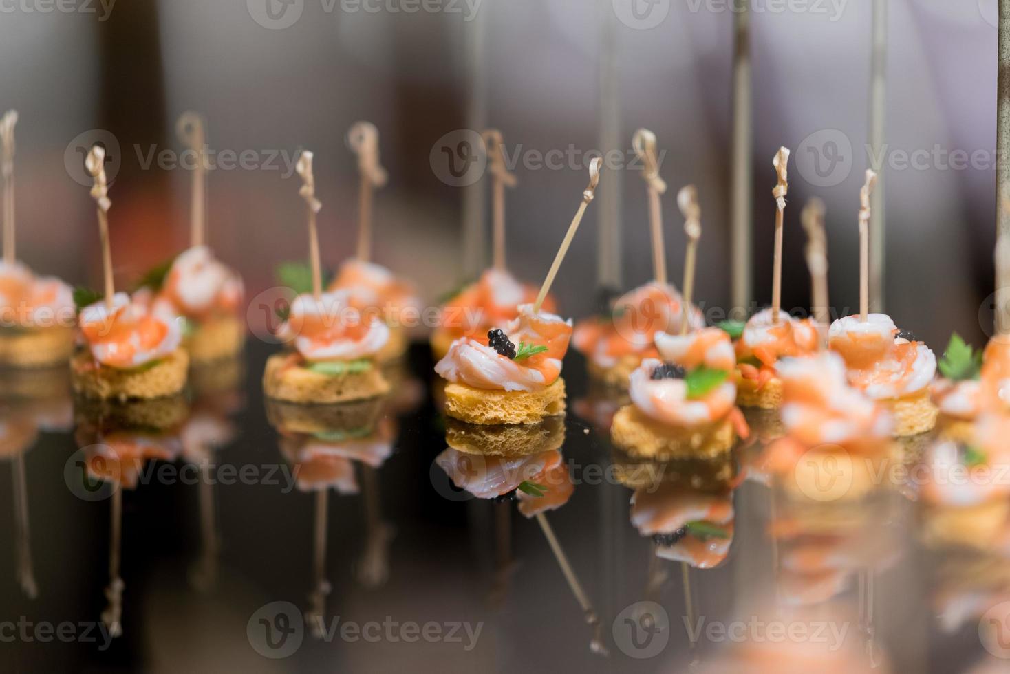 Sandwich, mini canapes, buffet food, catering food party at restaurant, snacks and appetizers, mini cake, food for the event photo