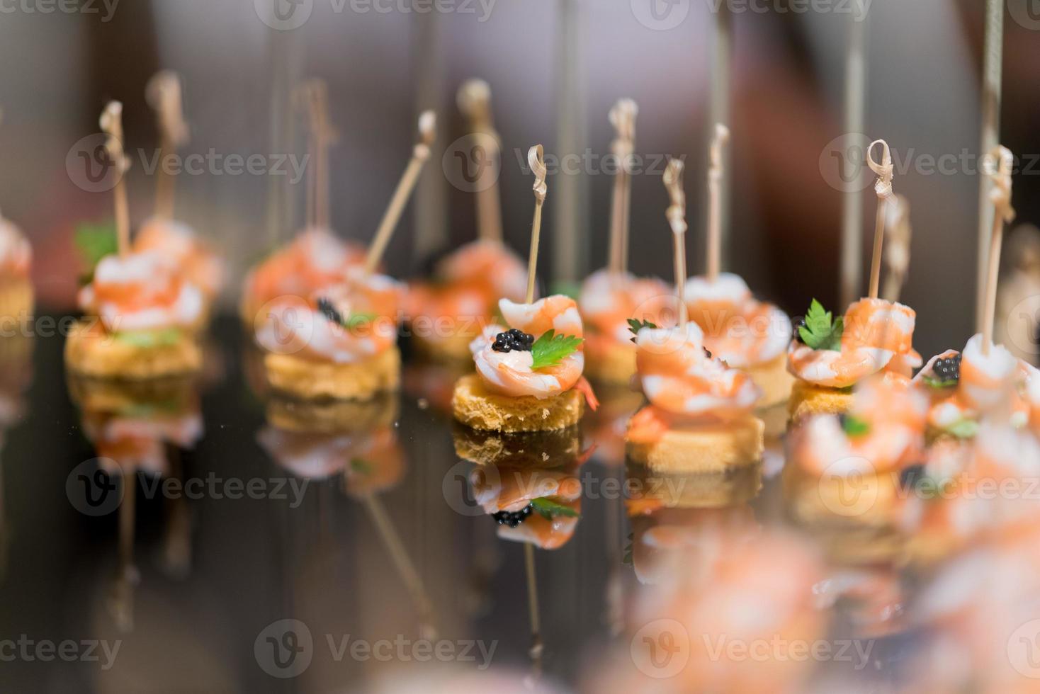 Sandwich, mini canapes, buffet food, catering food party at restaurant, snacks and appetizers, mini cake, food for the event photo