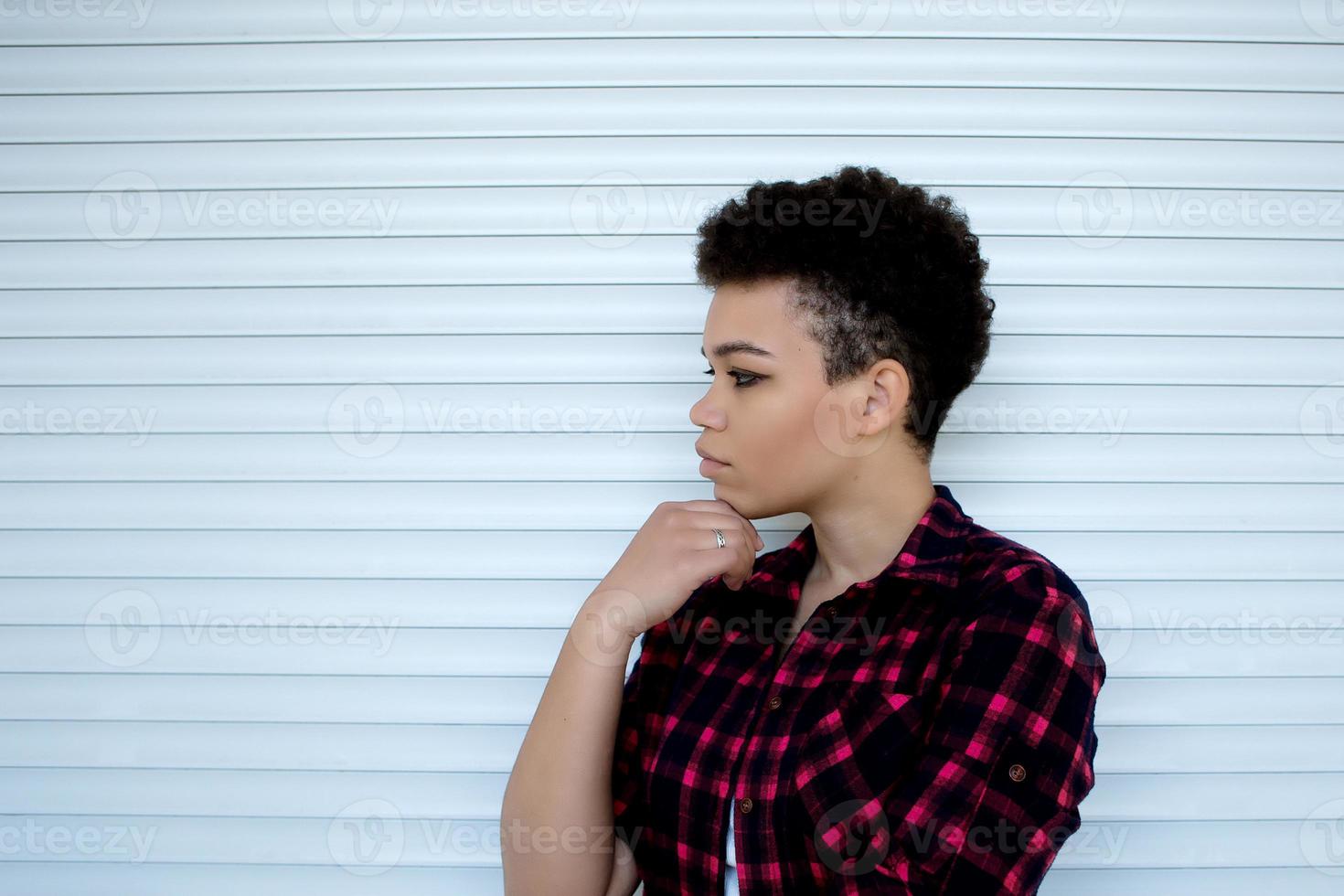 Serious and beautiful african american woman with short hair, lifestyle photo