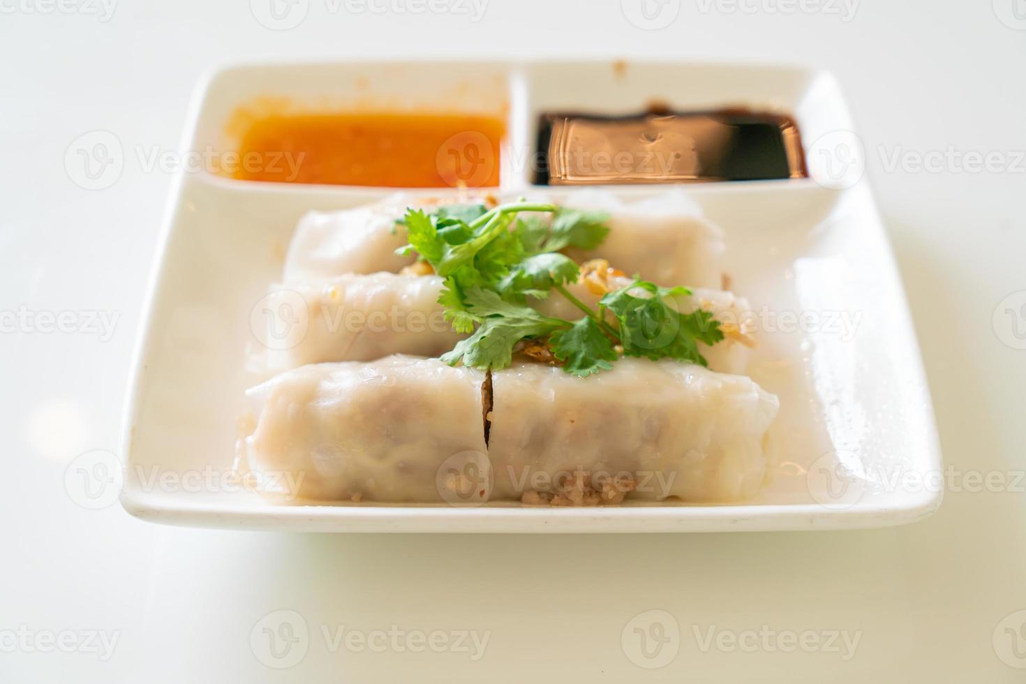 Chinese Steamed Rice Noodle Rolls With Crab photo