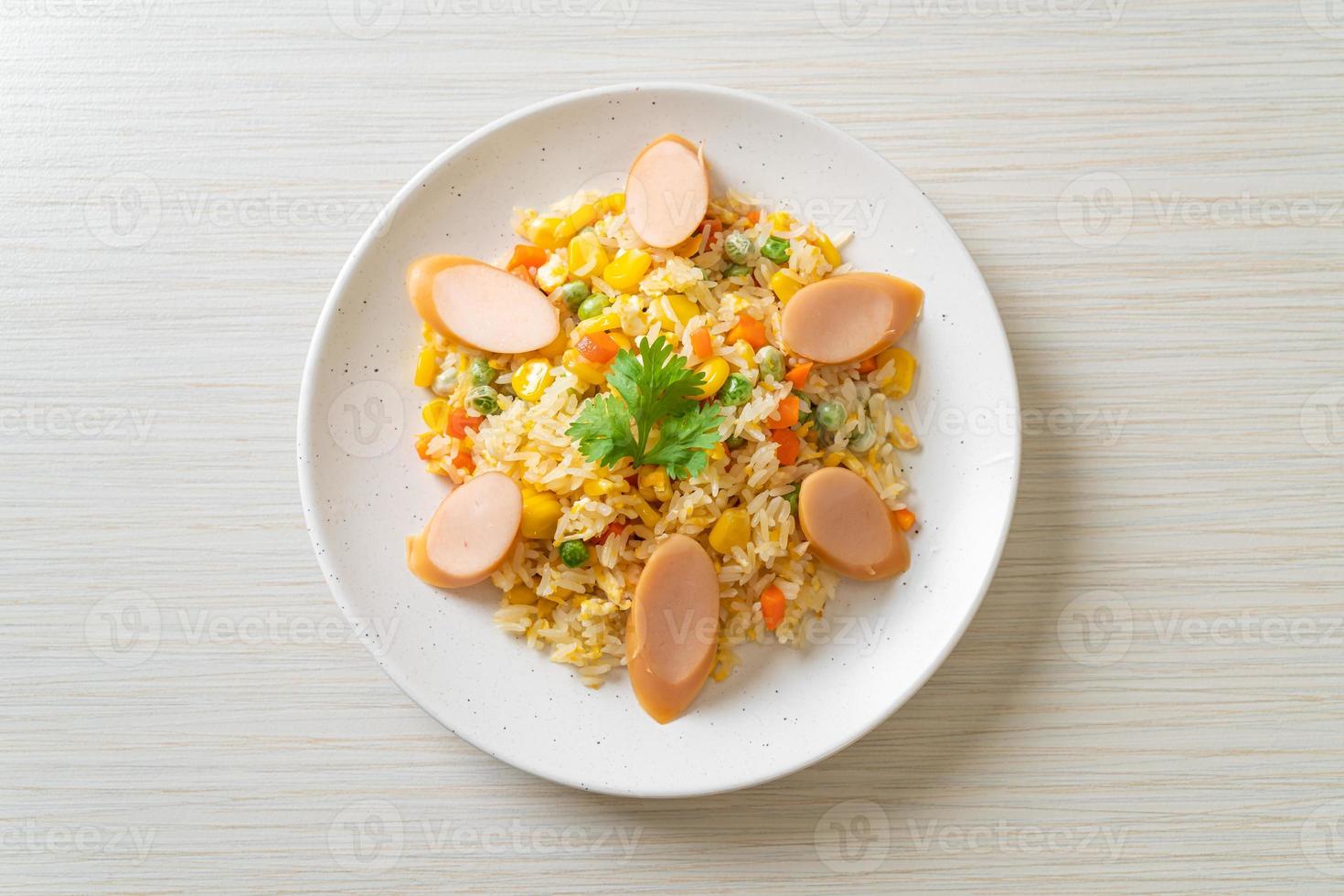 Fried rice with sausage and mixed vegetable photo