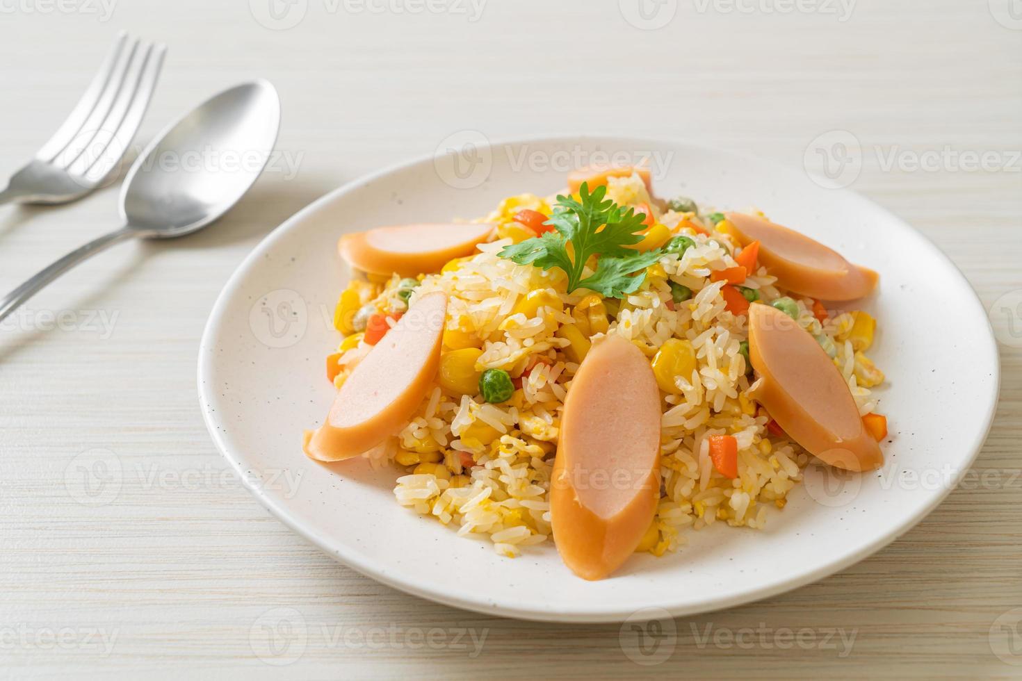 Fried rice with sausage and mixed vegetable photo