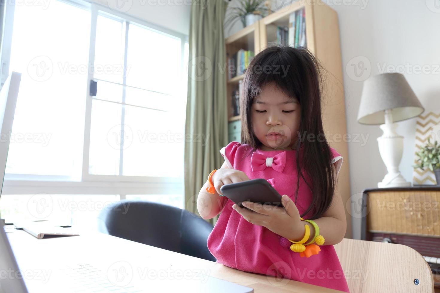 Kid with Technology photo