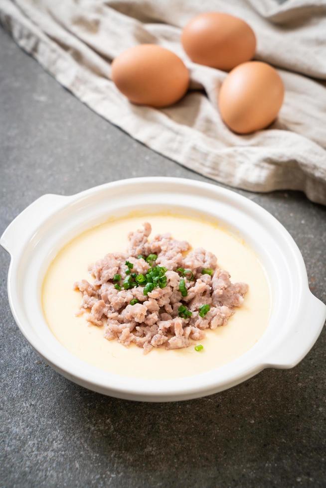 Homemade steamed egg with minced pork photo