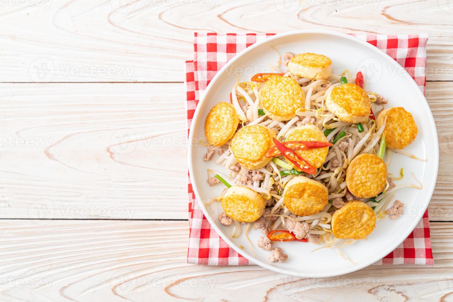 Stir-fried bean sprout, egg tofu, and minced pork - Asian food style photo