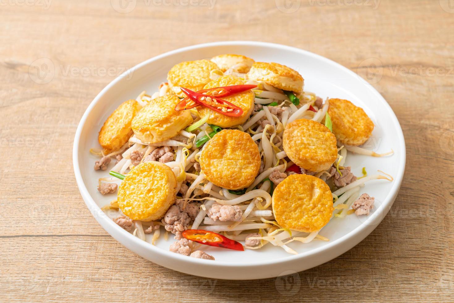 Stir-fried bean sprout, egg tofu, and minced pork - Asian food style photo