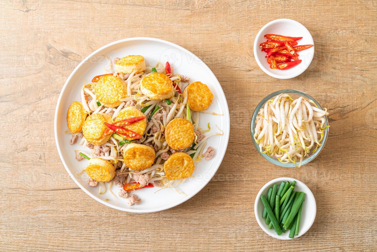 Stir-fried bean sprout, egg tofu, and minced pork - Asian food style photo