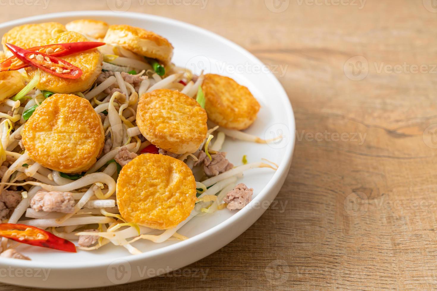 Stir-fried bean sprout, egg tofu, and minced pork - Asian food style photo