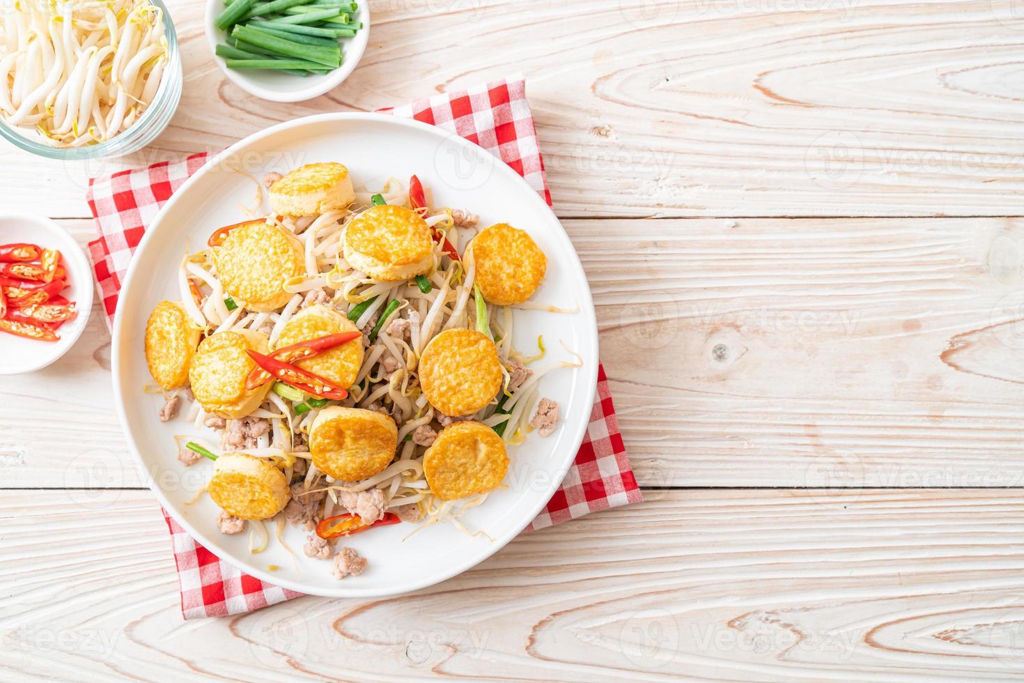 Stir-fried bean sprout, egg tofu, and minced pork - Asian food style photo