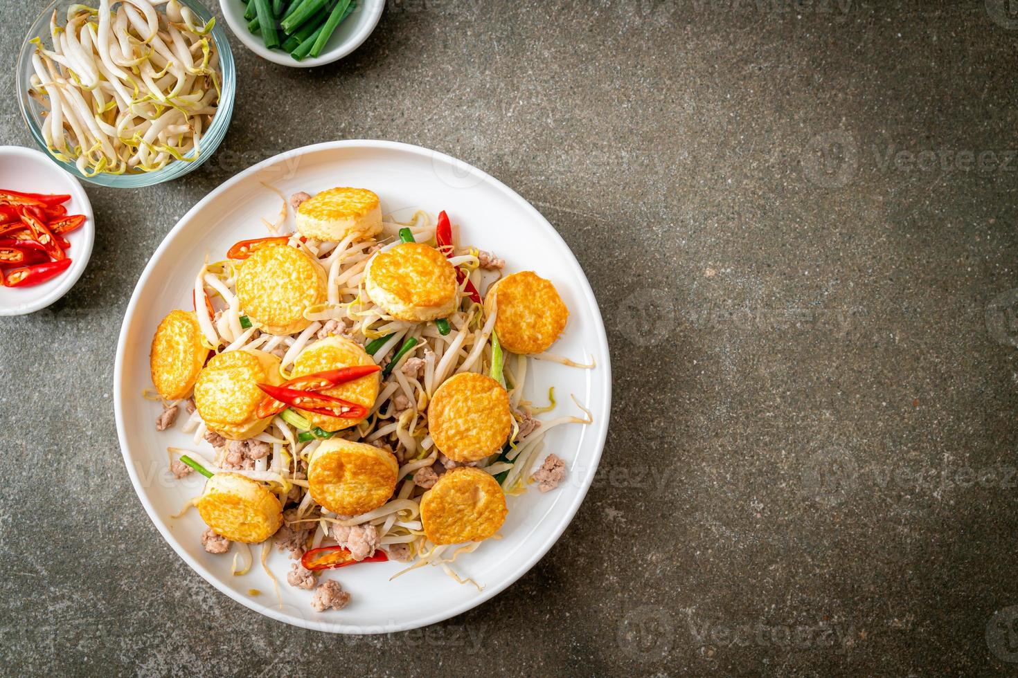 Stir-fried bean sprout, egg tofu, and minced pork - Asian food style photo