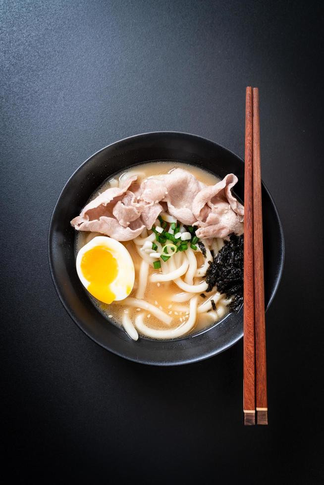 Udon ramen noodles with pork soup - Japanese style photo