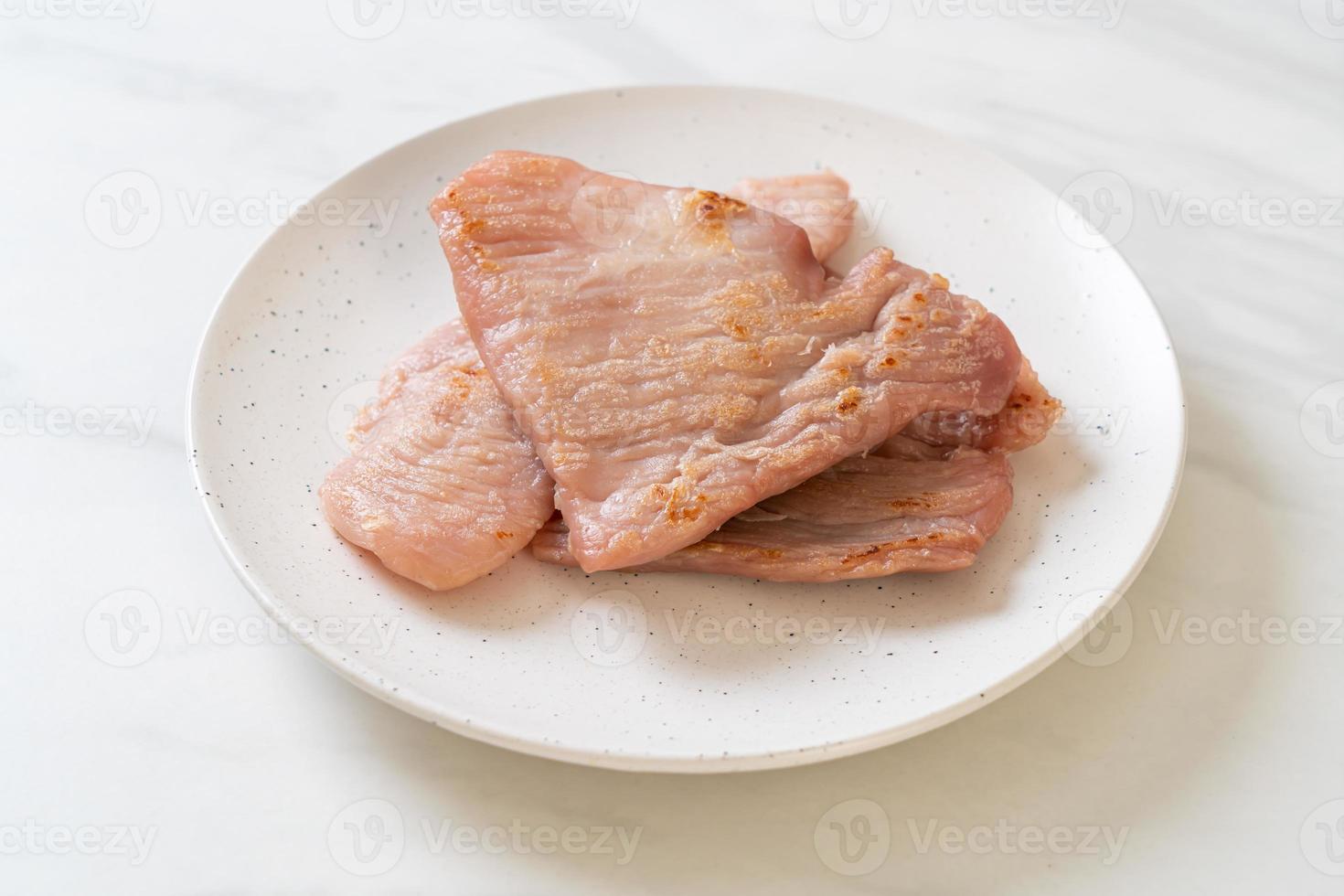 Fried sun-dried pork on plate photo