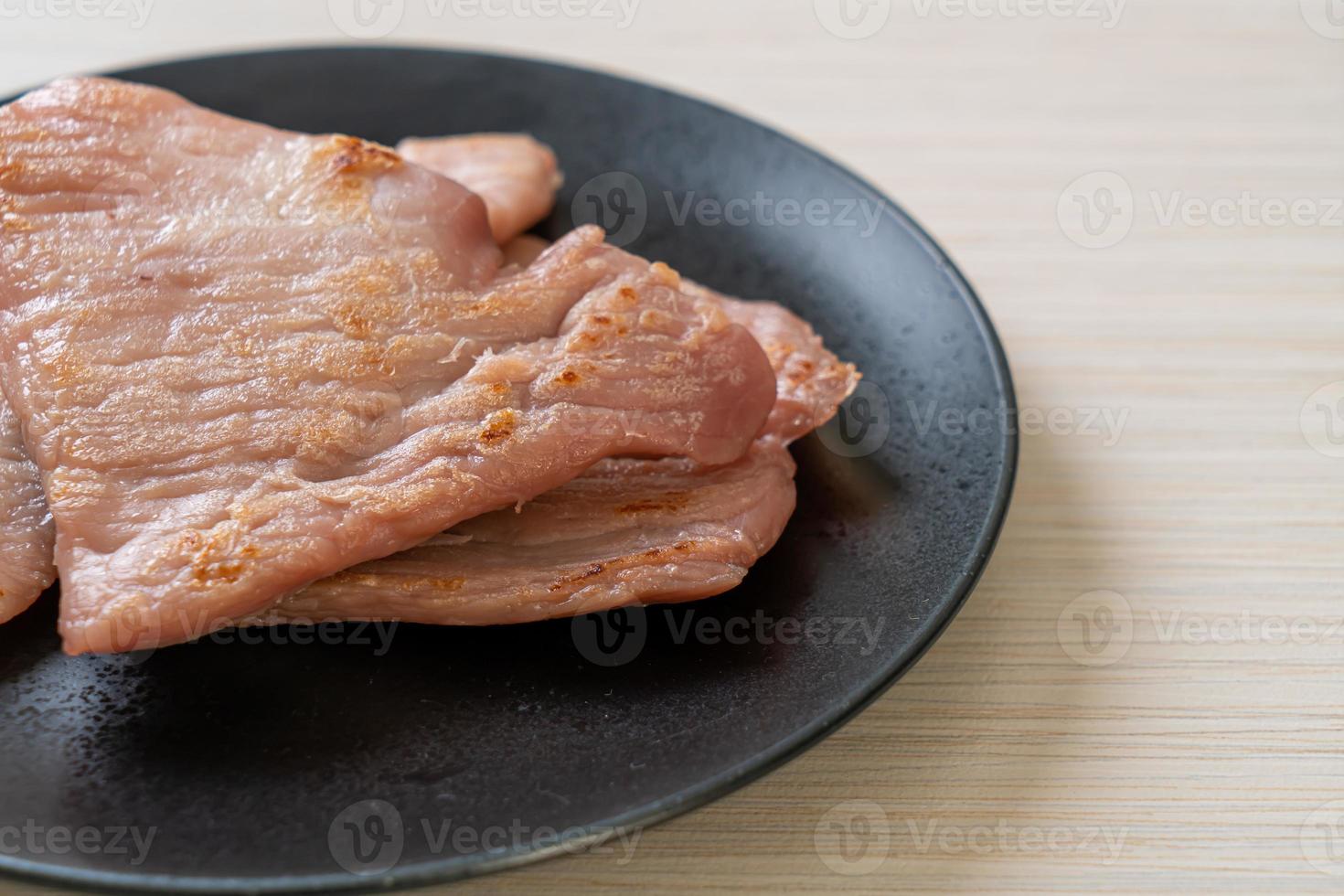 Fried sun-dried pork on plate photo