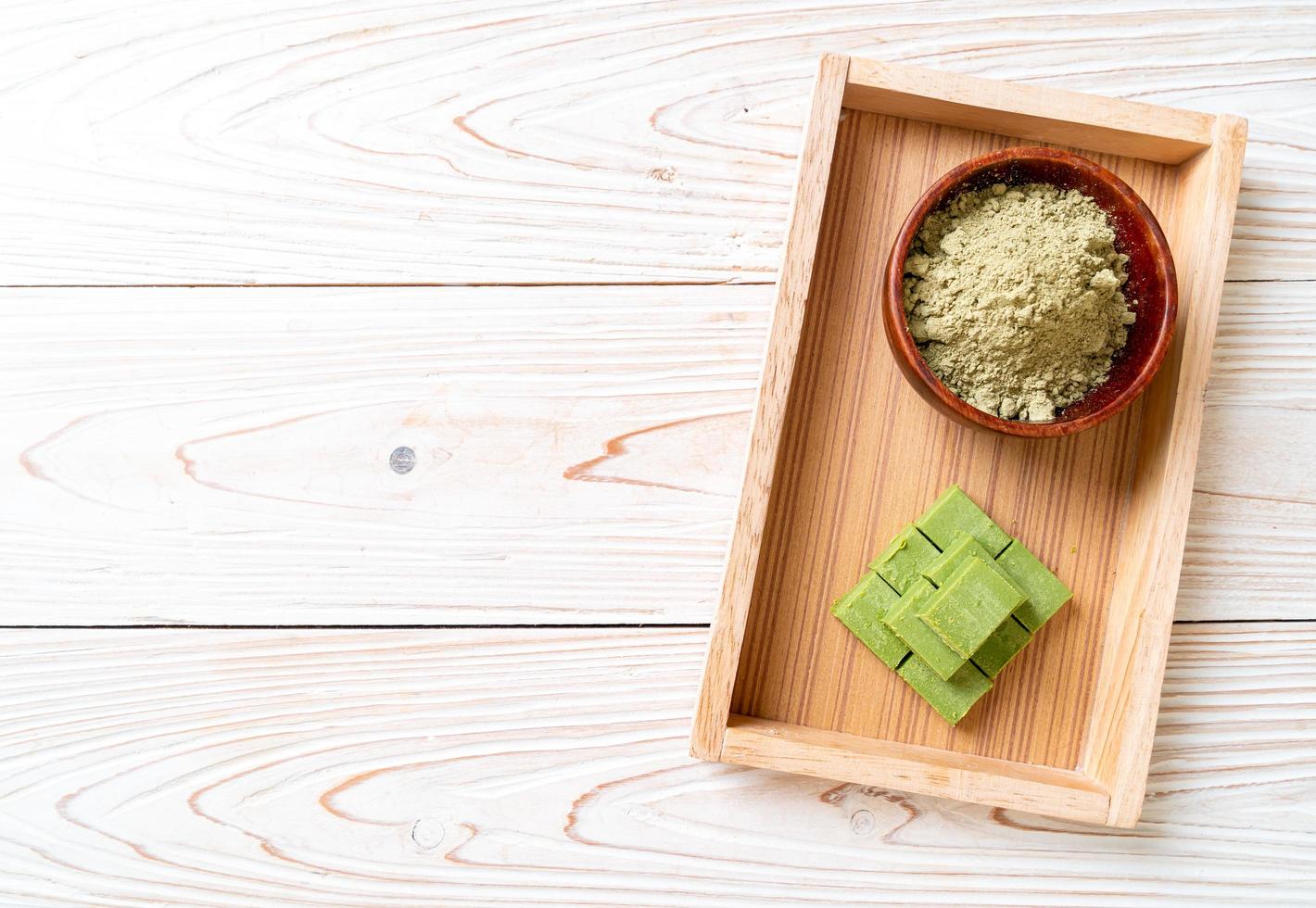 Fresh and soft matcha green tea chocolate with matcha green tea powder photo
