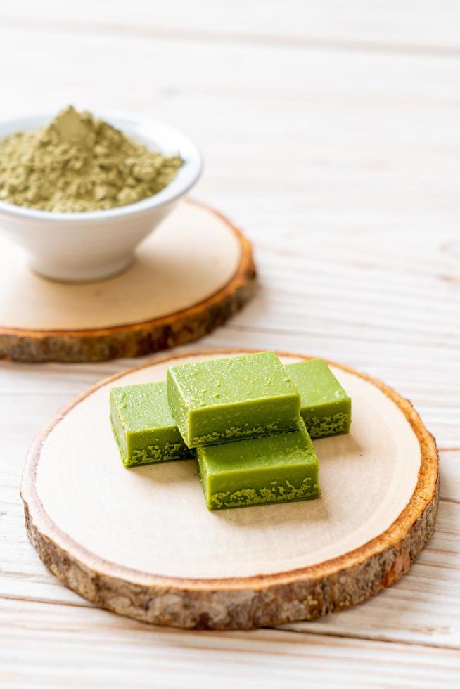 Fresh and soft matcha green tea chocolate with matcha green tea powder photo